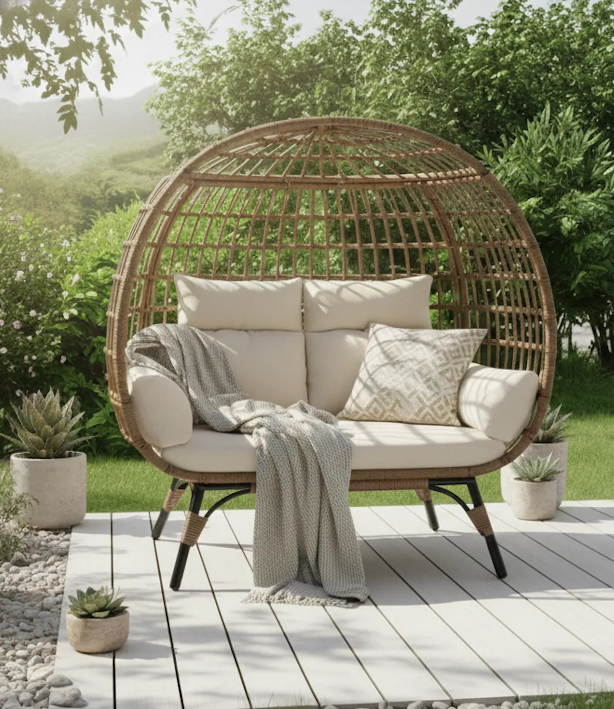 Wicker egg-shaped chair with cushions on a wooden deck in a garden setting